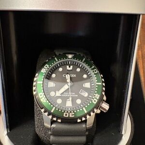 Men’s Citizen Eco-Drive Watch with Green and Black Accents